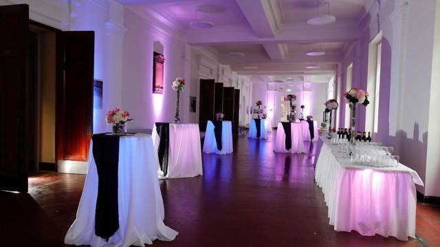 Pod tables in the Kevin Barry Room concourse at NCH set up for a drinks reception