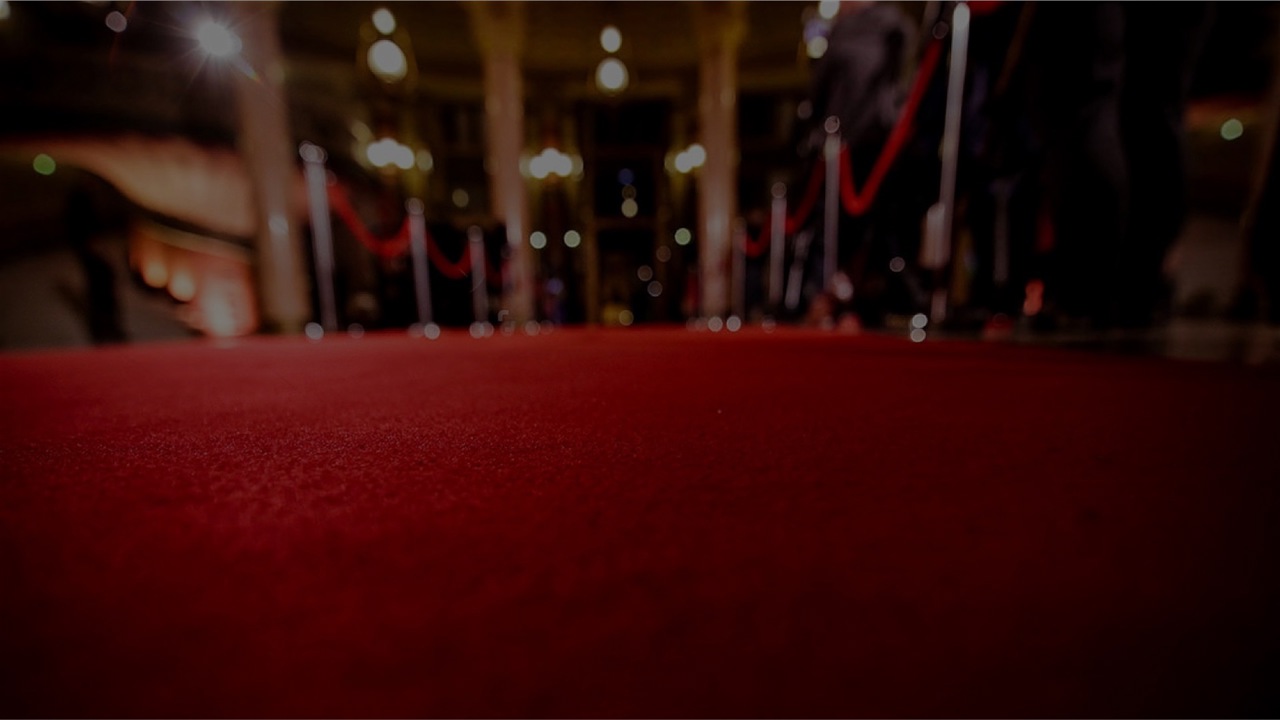 Close-up shot of a red carpet parallel to the ground